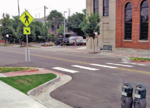 Crosswalk with pedestrian sign