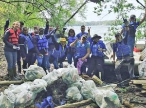 Volunteers cleaning up areas on Earth Day