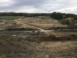 Hills of dirt on a construction site.